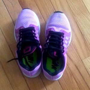 Pink Nike running shoes